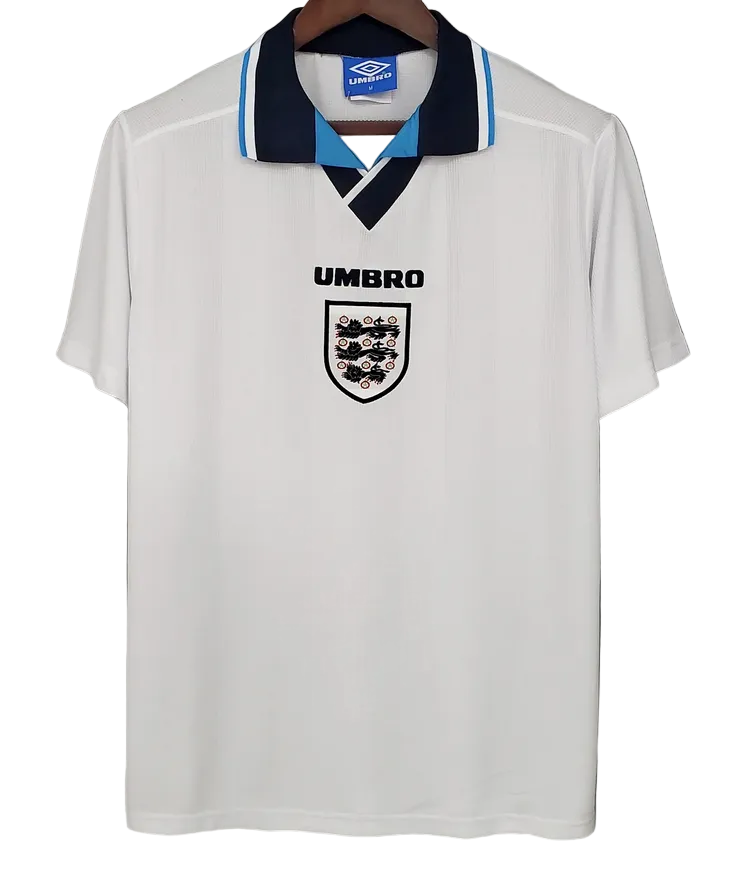 White sports jersey with Umbro logo on a gray background