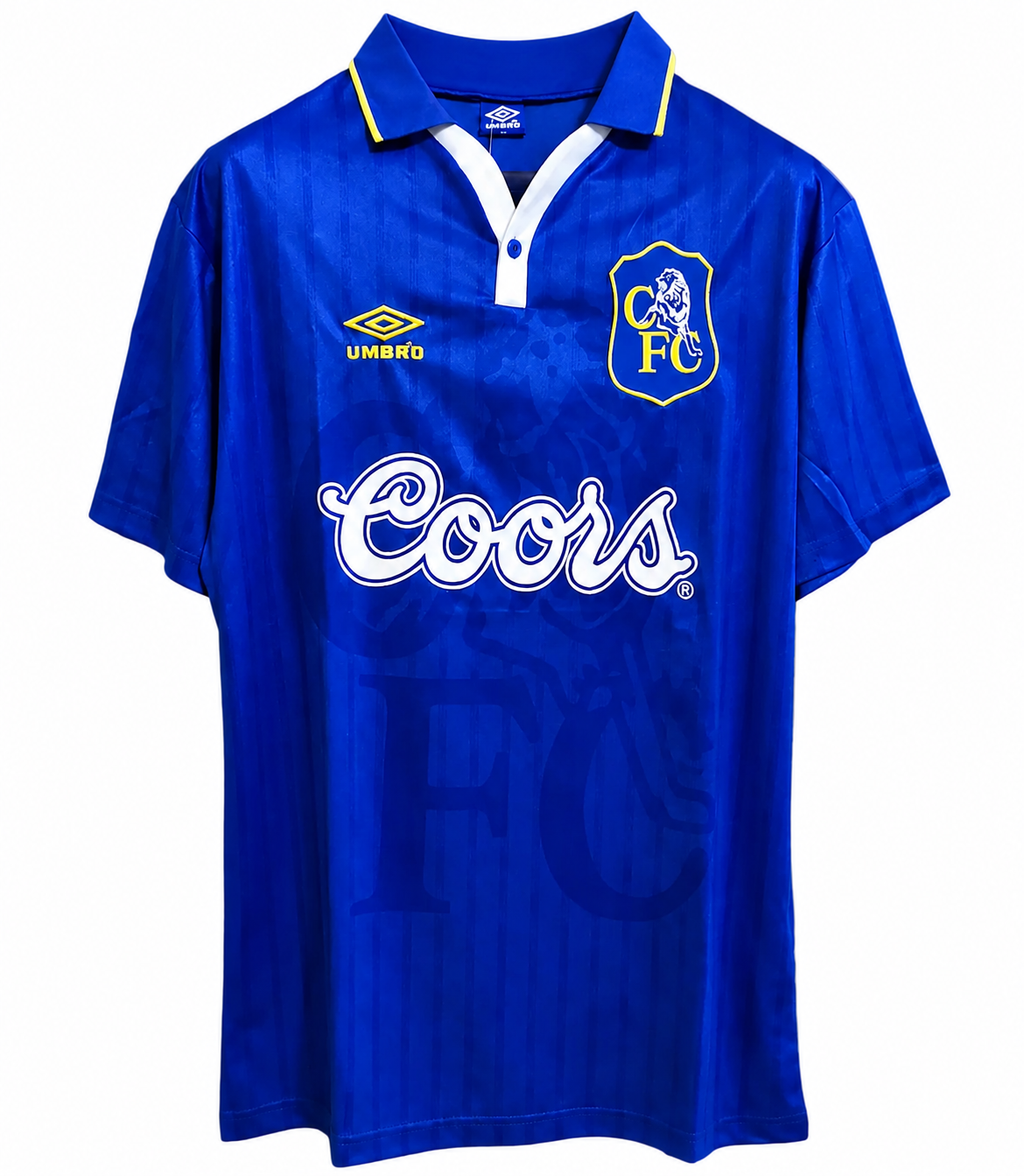 Blue sports jersey with Coors logo and Umbro branding on a white background