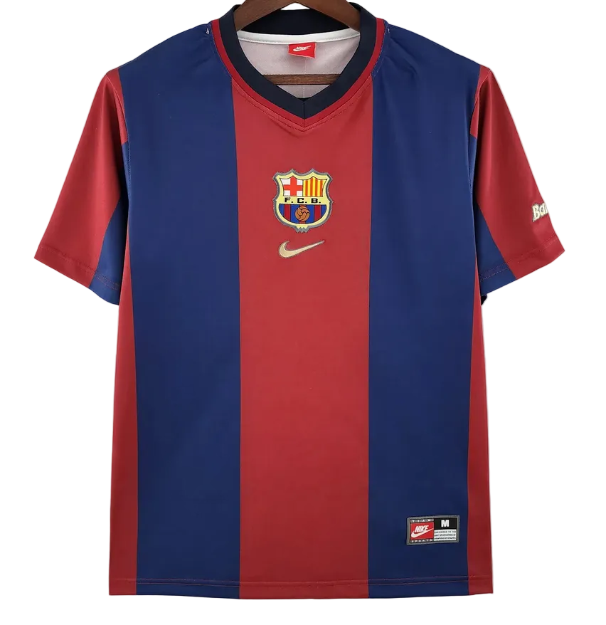 Red and blue sports jersey with Nike logo on a white background