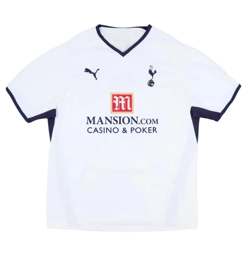 White sports jersey with black accents and logos on a white background
