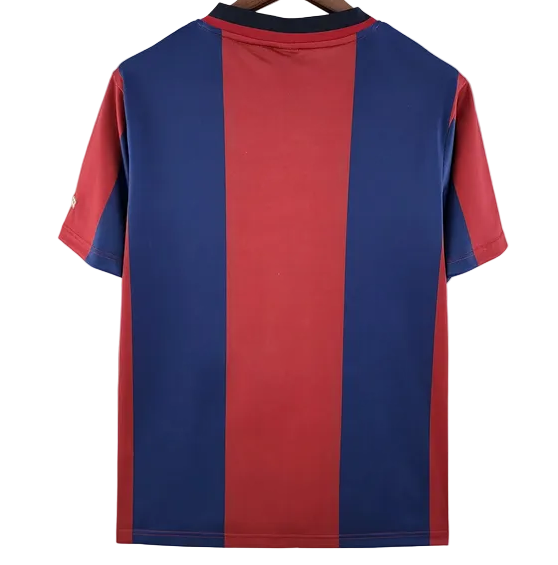 Red and blue striped shirt on a hanger against a white background